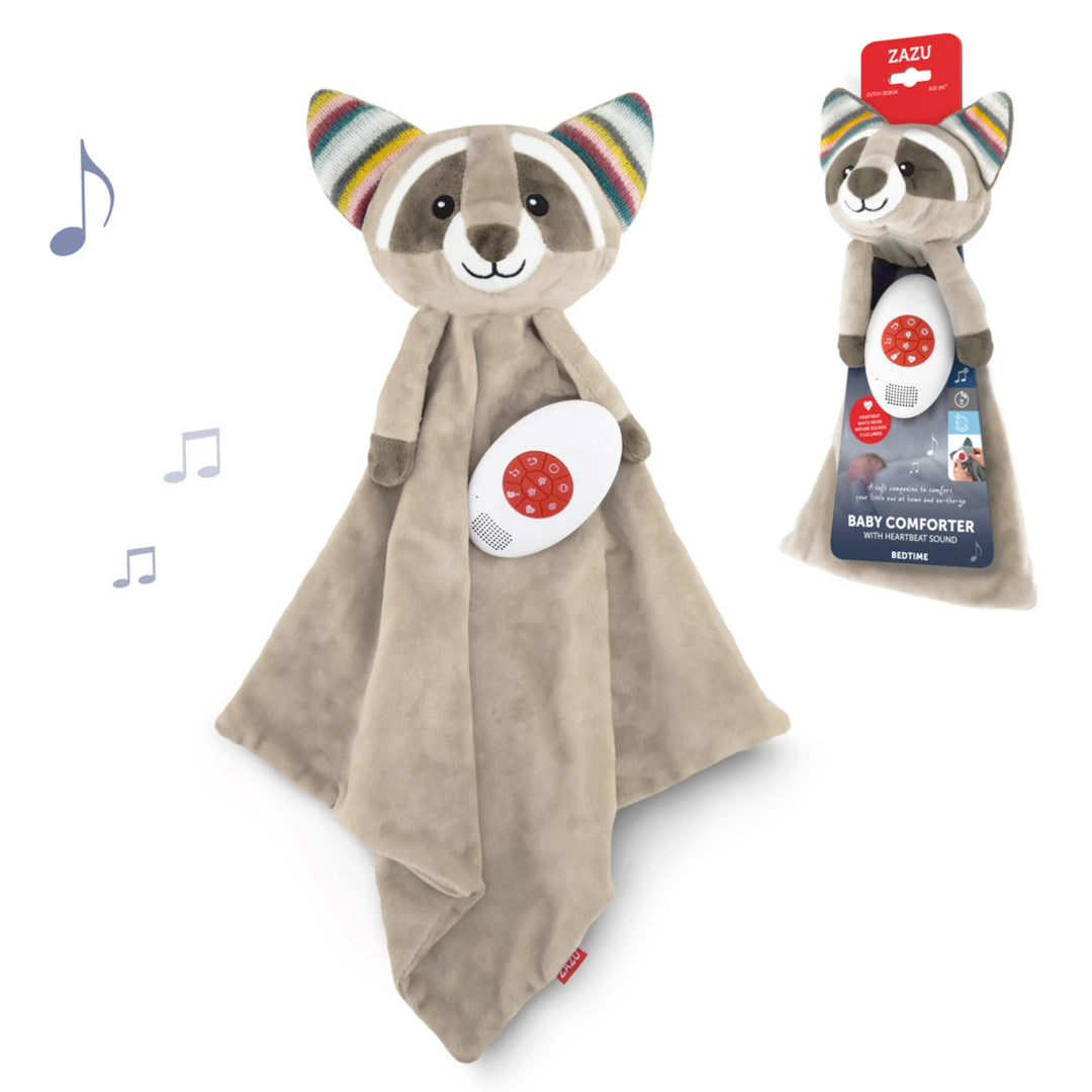 ZAZU Robin raccoon baby comforter with plush blanket and soothing sound module, shown alongside retail packaging featuring white noise, heartbeat and lullaby functions - soft newborn sleep aid.