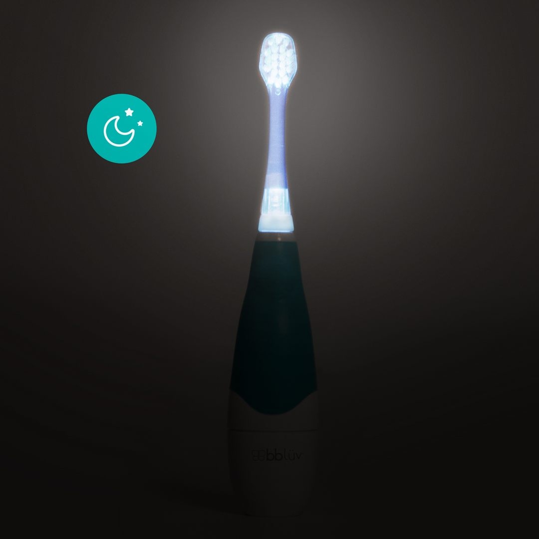 BBLuv Sonik electric toothbrush in night lighting, showcasing the LED light when the toothbrush is on