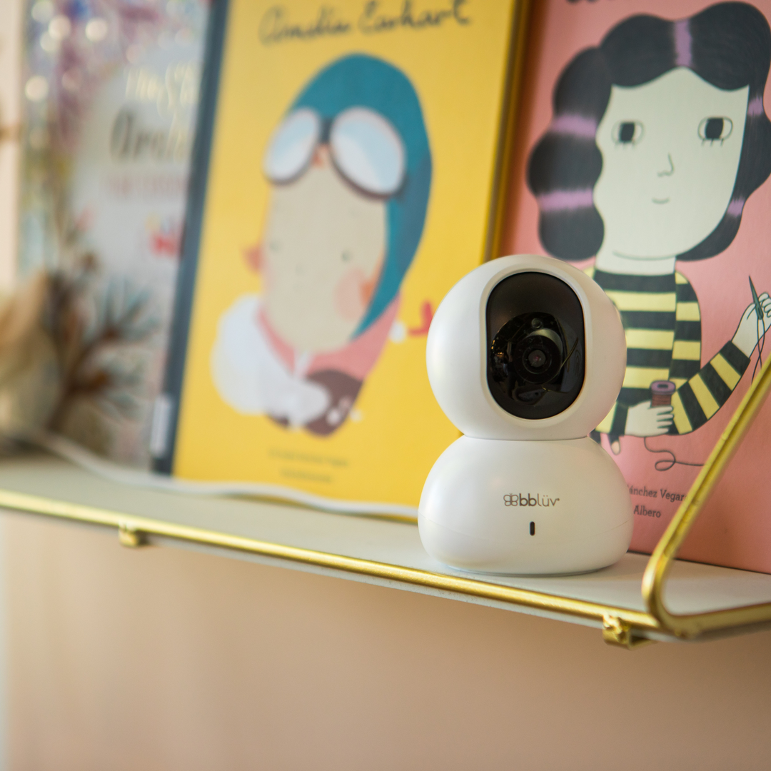 BBluv cam baby monitor placed on a shelf in the baby's bedroom to monitor their sleep