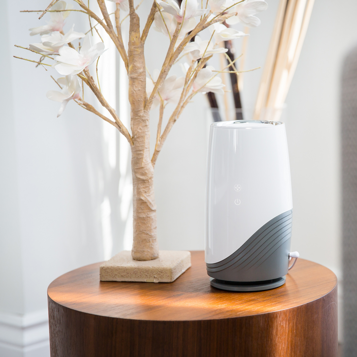 BBLuv Pure 3-in-1 air purifier with HEPA filter displayed on a side table