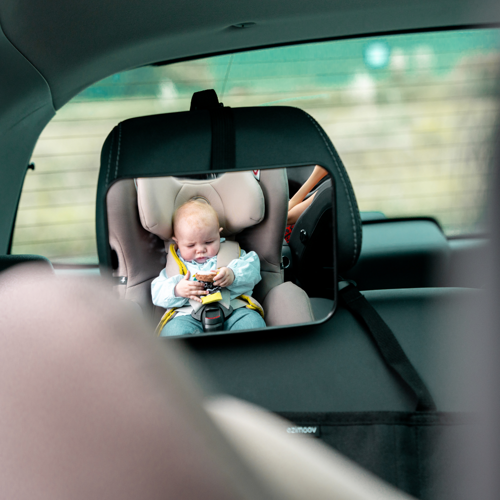 This shows the Rear Facing Car Seat Mirror installed with a wide view of an infant in their car seat.