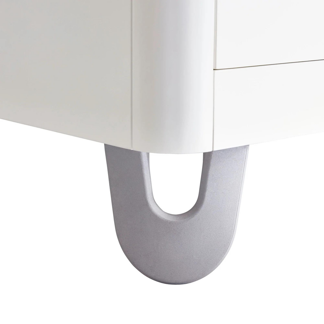 This image is a close up shot of the rounded aluminium legs of the Serena Dresser.