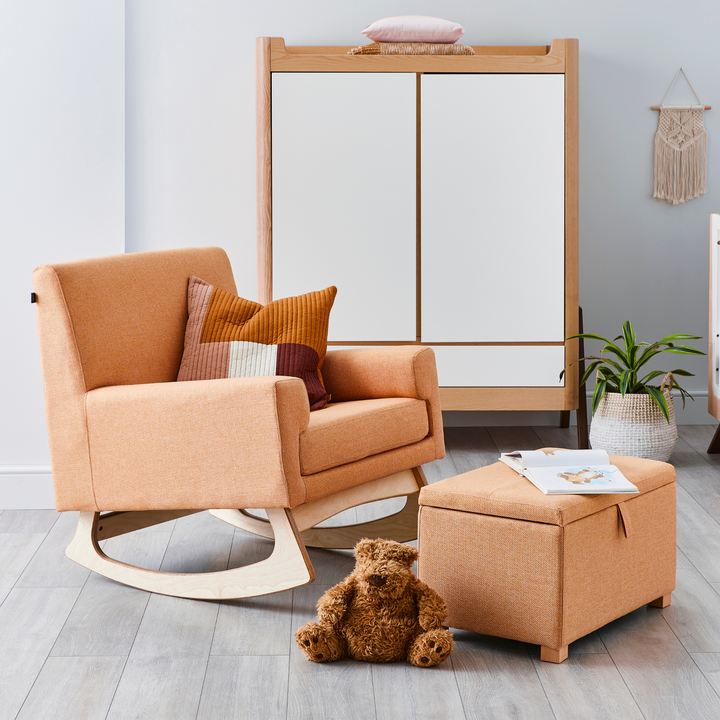 Lifestyle of Gaia Baby Hera Wardrobe in Natural Ash and Walnut with Serena Nursing and Rocking chair and Serena Footstool and Storage box